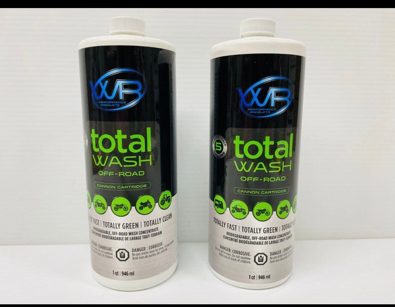 Two bottles of XFR Total Wash Off-Road car wash product on a white background