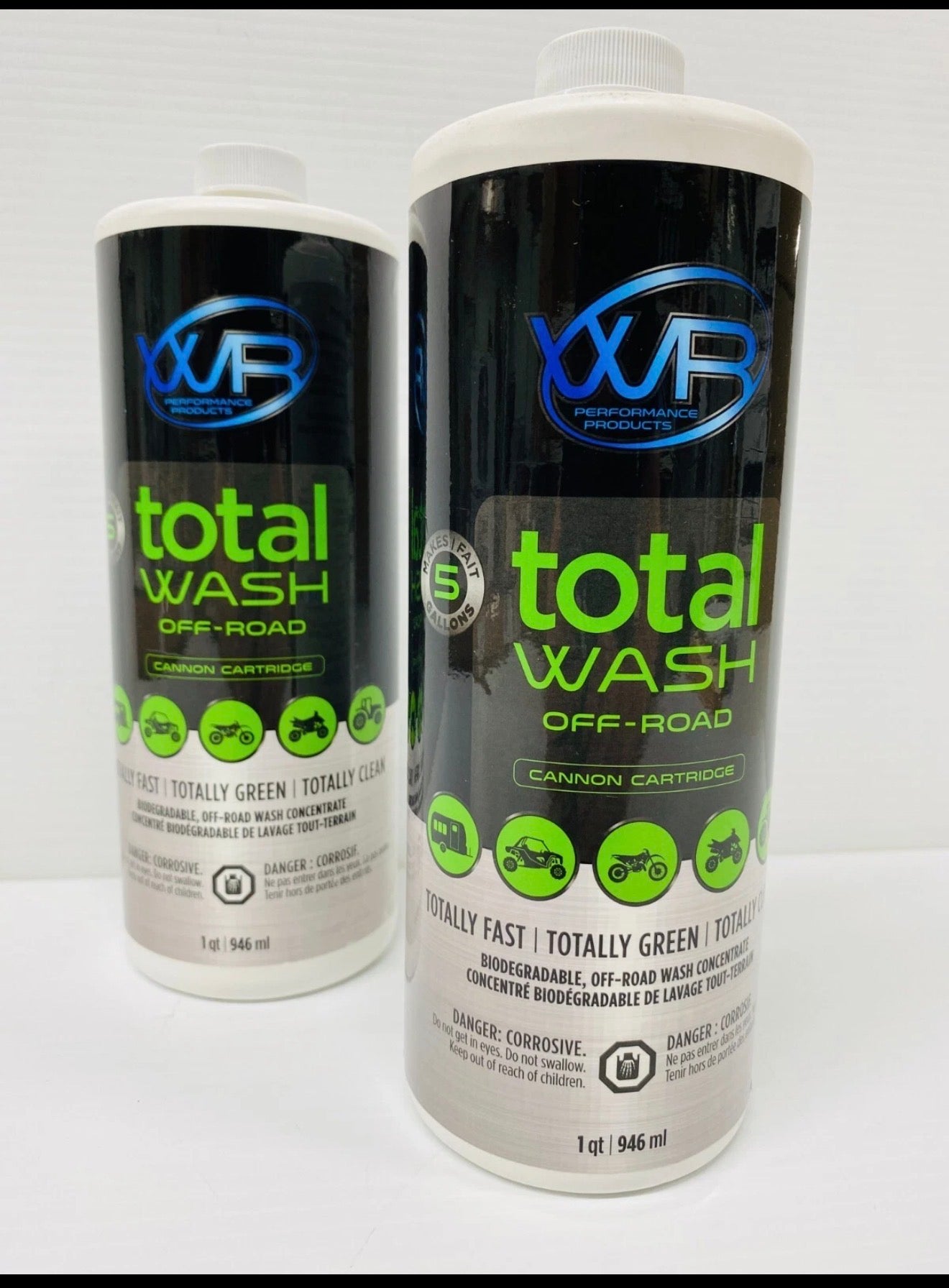 Two bottles of XVF total wash off-road cleaning solution on a white background